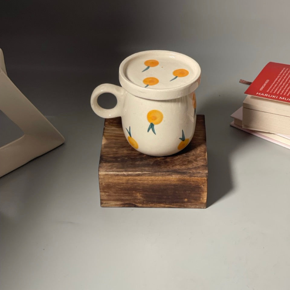 Berry print ceramic mug with versatile saucer in blueberry and yellowberry prints