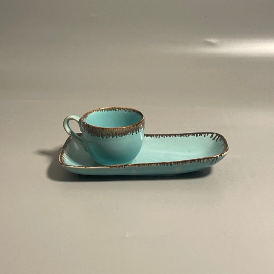 Biscotti set in blue with long cup and saucer with gold drip on the rims