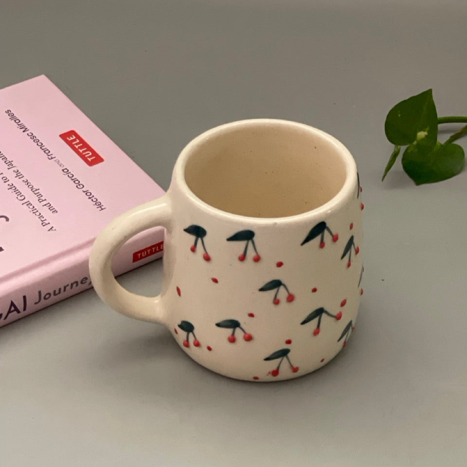 Set of two ceramic mugs with heart and cherry prints in Pinterest-inspired design