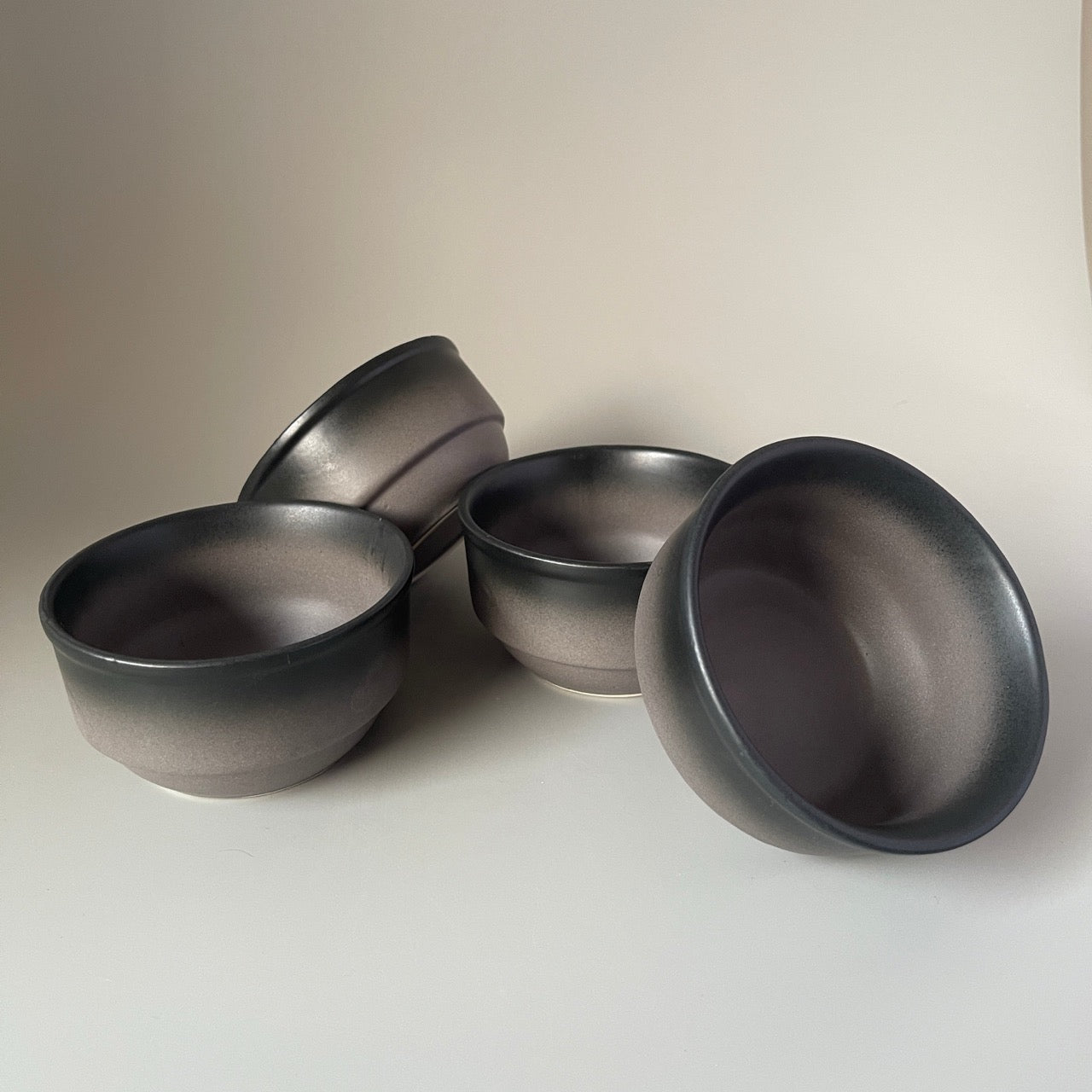 Set of 2 dual black toned ceramic dinner plates and dal bowls – modern dinnerware for stylish table settings