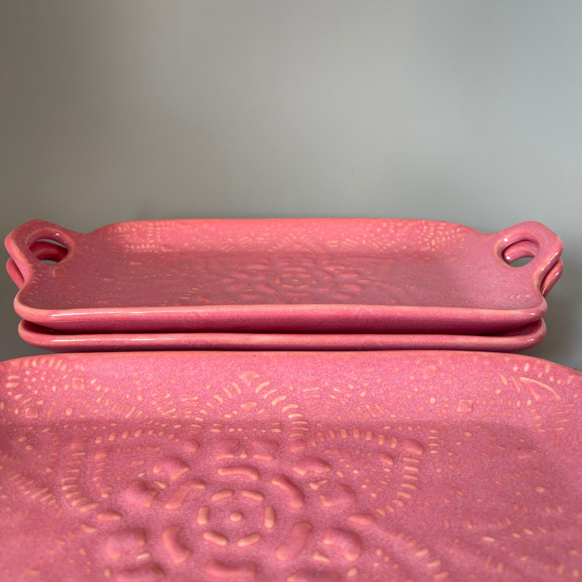 Floral embossed ceramic platter tray for serving appetizers, desserts, or snacks in Indian homes