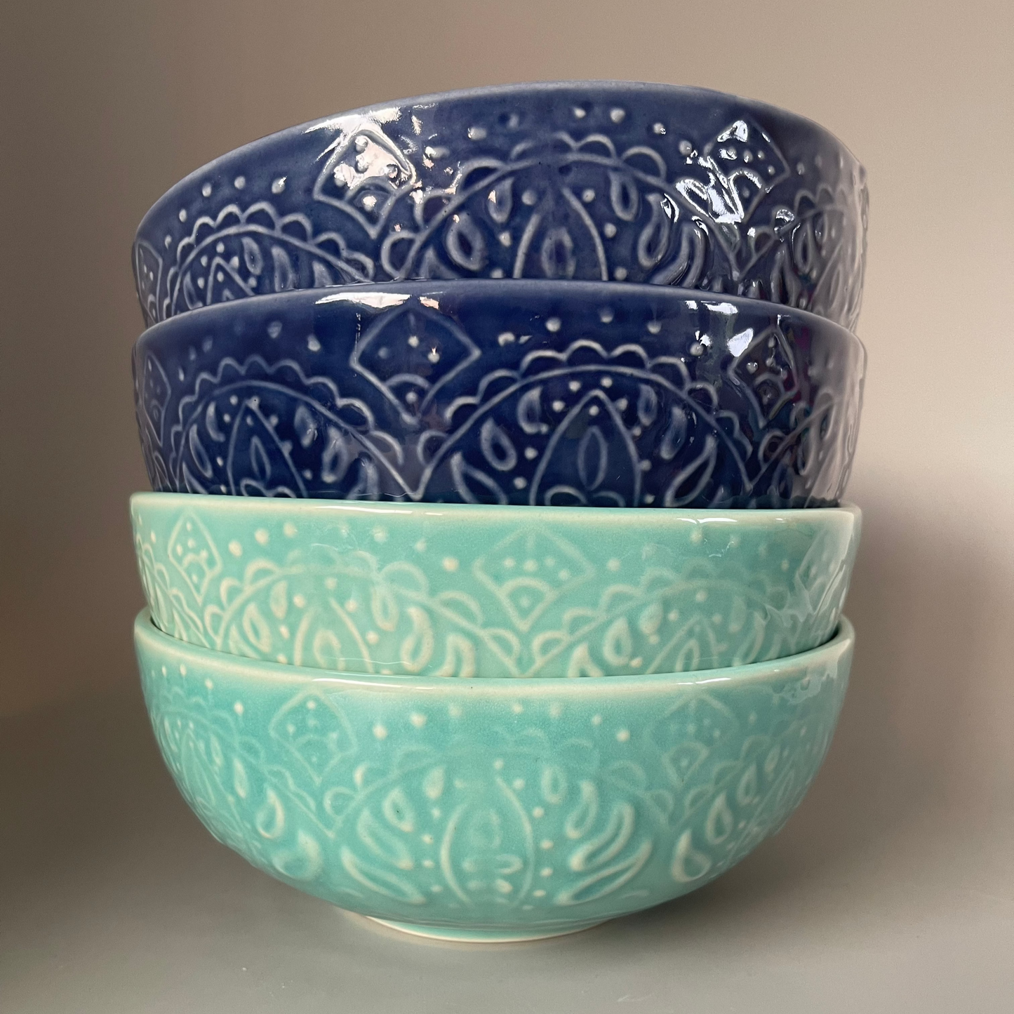 8-inch ceramic serve bowl with embossed flower design in blue and teal, perfect for salads, soups, and Indian side dishes