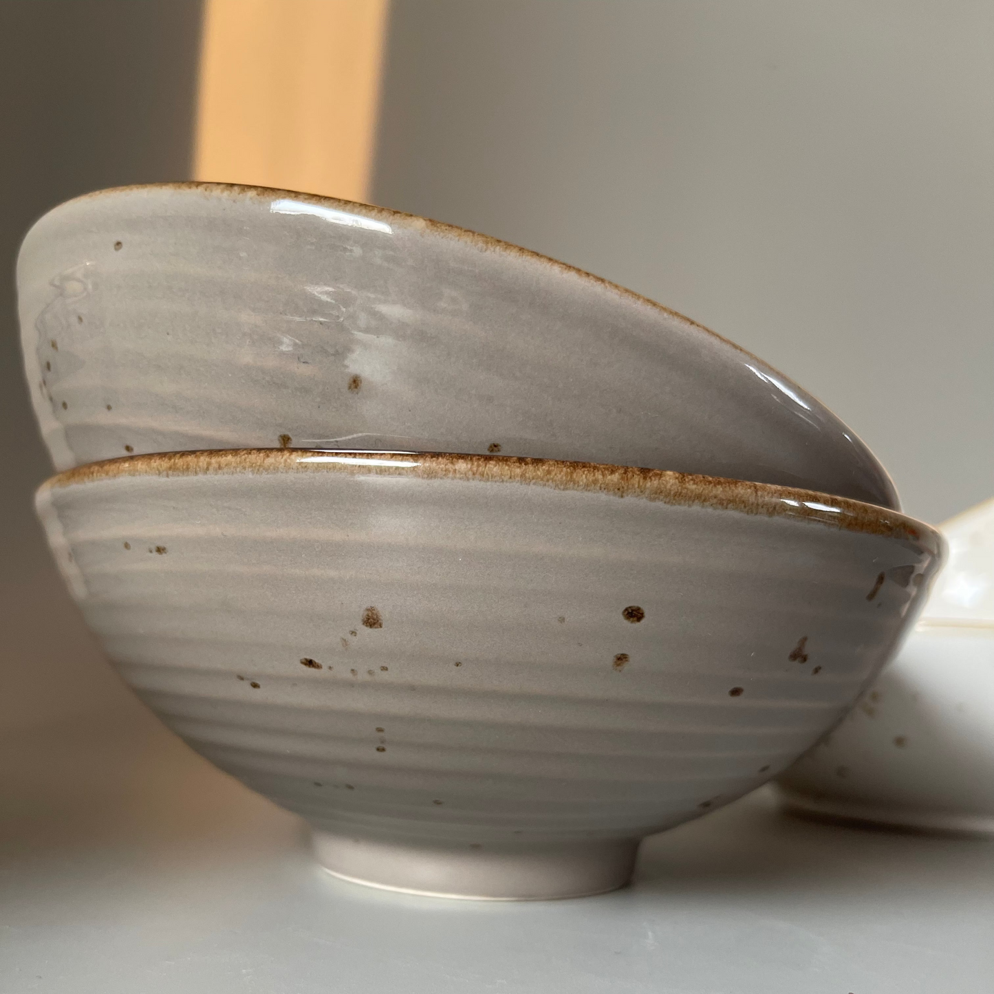 Set of 2 Greyite ribbed ceramic serve bowls with white interior and gold flecks – perfect for Indian meals and everyday serving