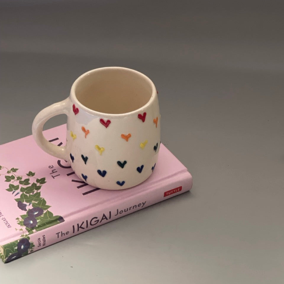 Set of two ceramic mugs with heart and cherry prints in Pinterest-inspired design