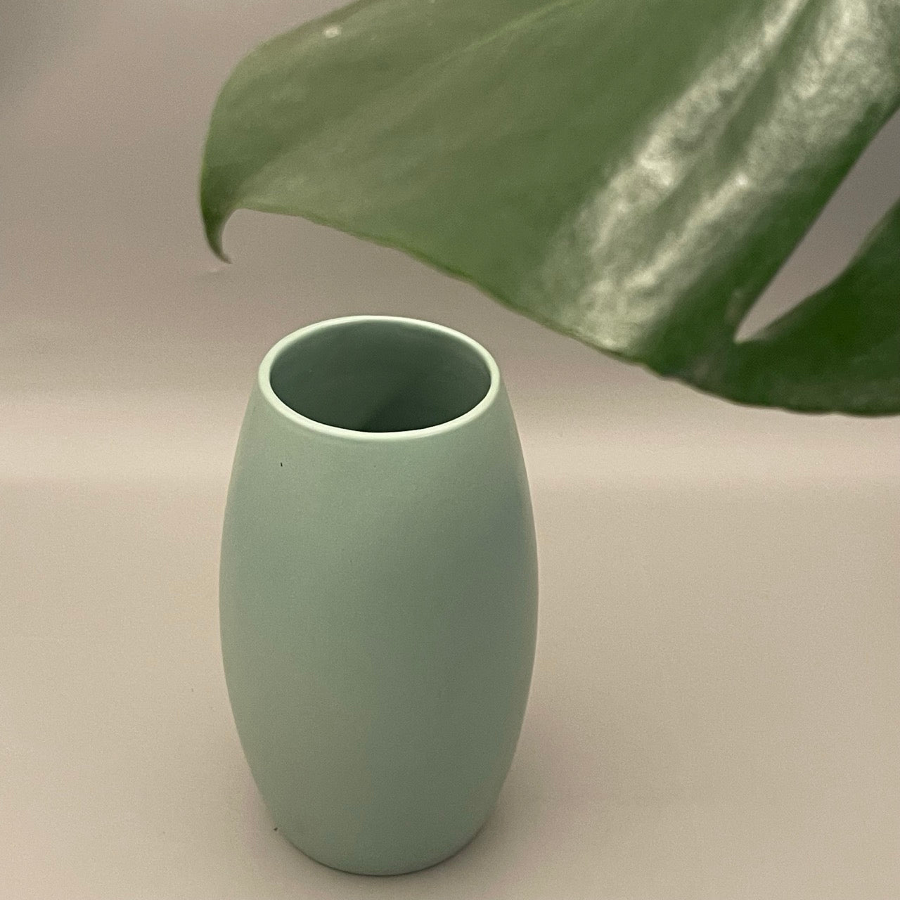 Medium ceramic vase with a drum-inspired shape and wide open mouth