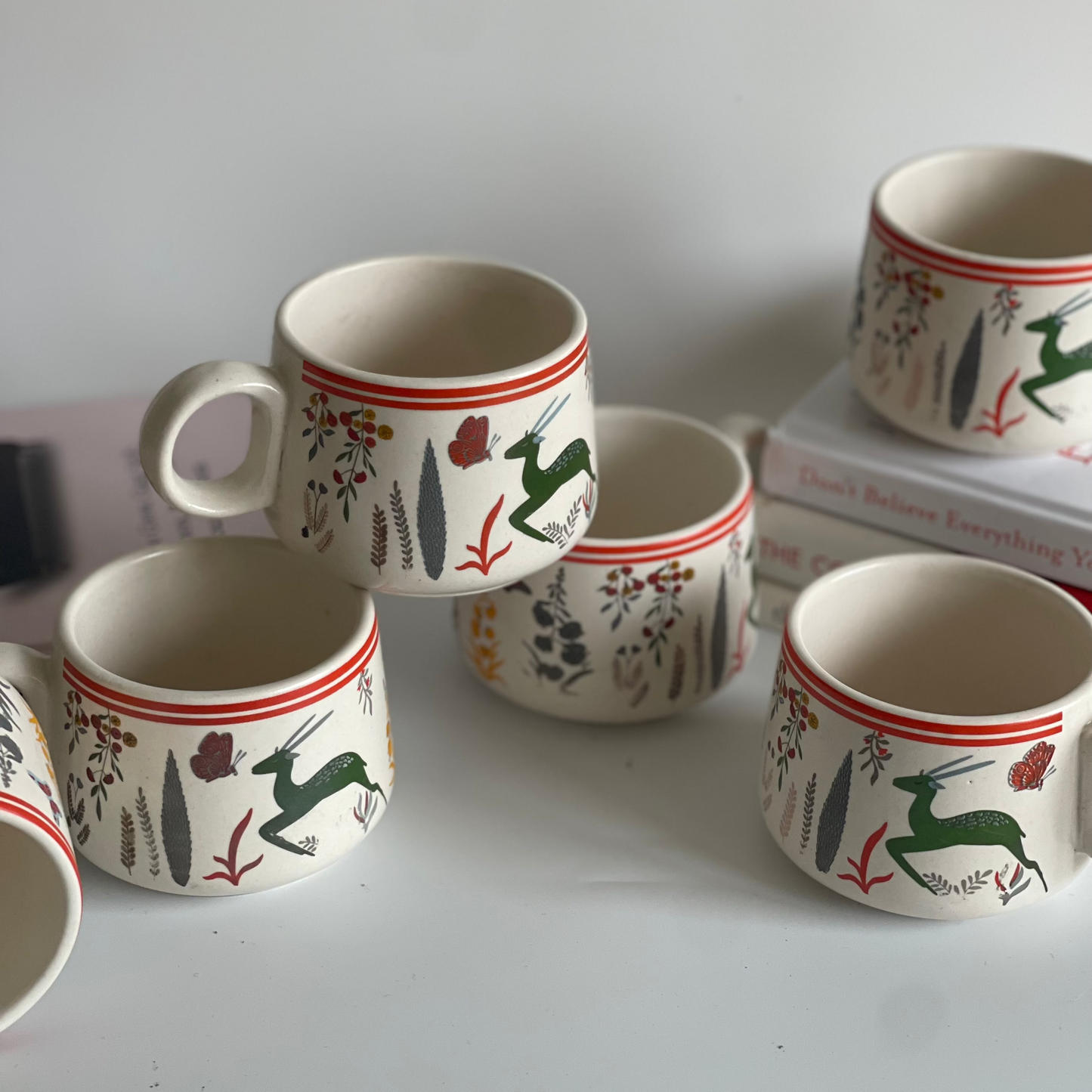 Sips of Nature ceramic tea cup set of 6 with assorted designs featuring deer, leaves, and nature motifs in earthy tones