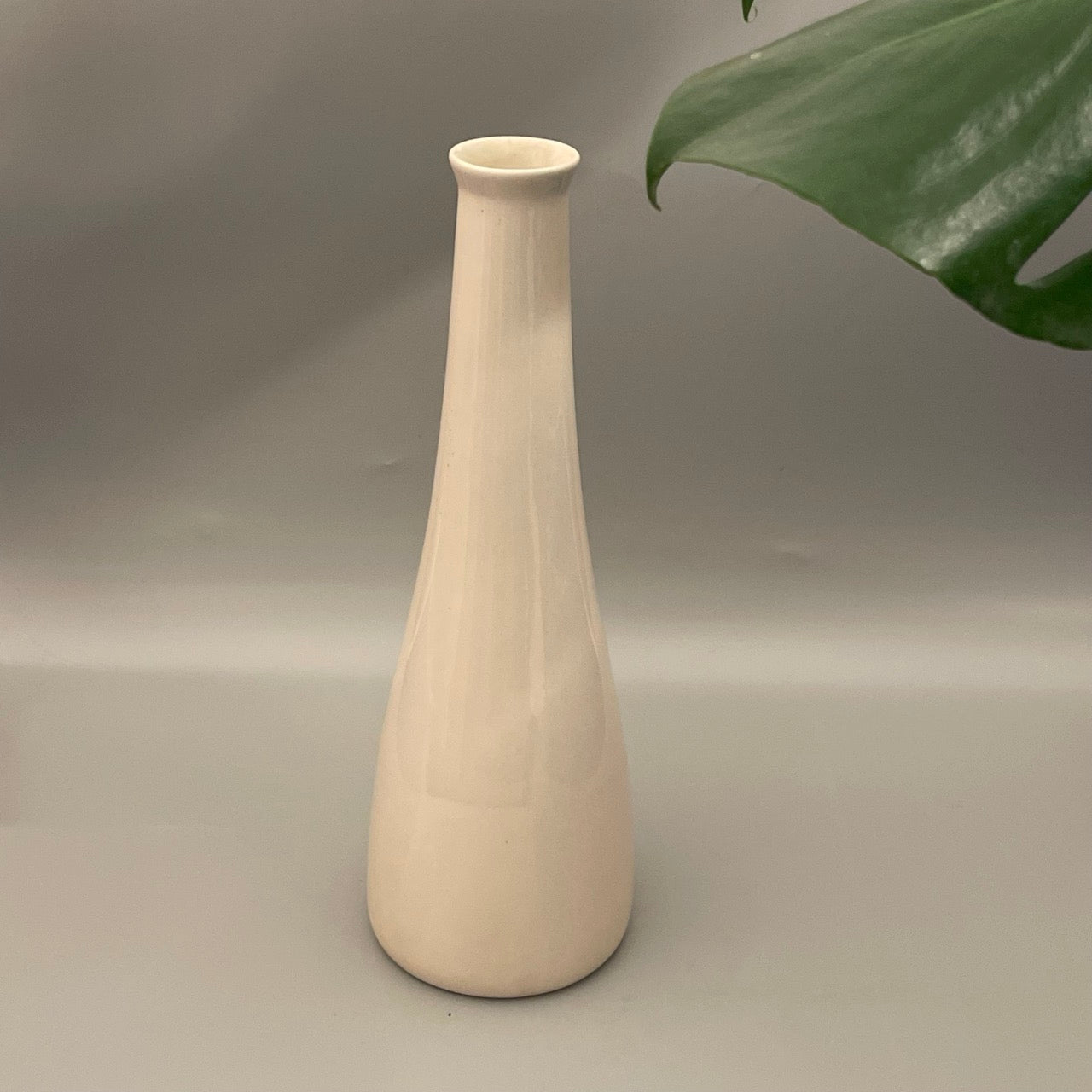White Elan vase with slender bottle form
