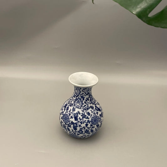 Handcrafted Chinese pottery vase with parrot and foliage design – elegant statement decor for home interiors