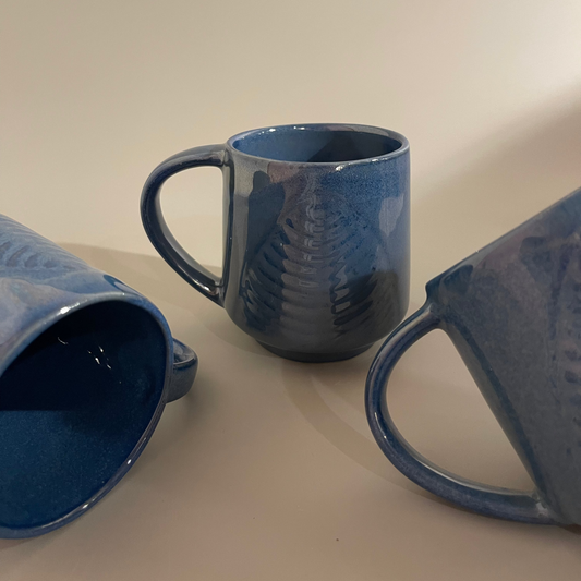 Set of 2 blue ceramic mugs with leaf imprint texture – ideal for tea, coffee, or hot beverages