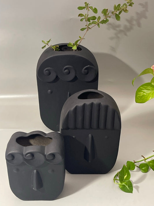 Set of 3 ceramic face print vases in matte finish, sizes XS to M, abstract modern design