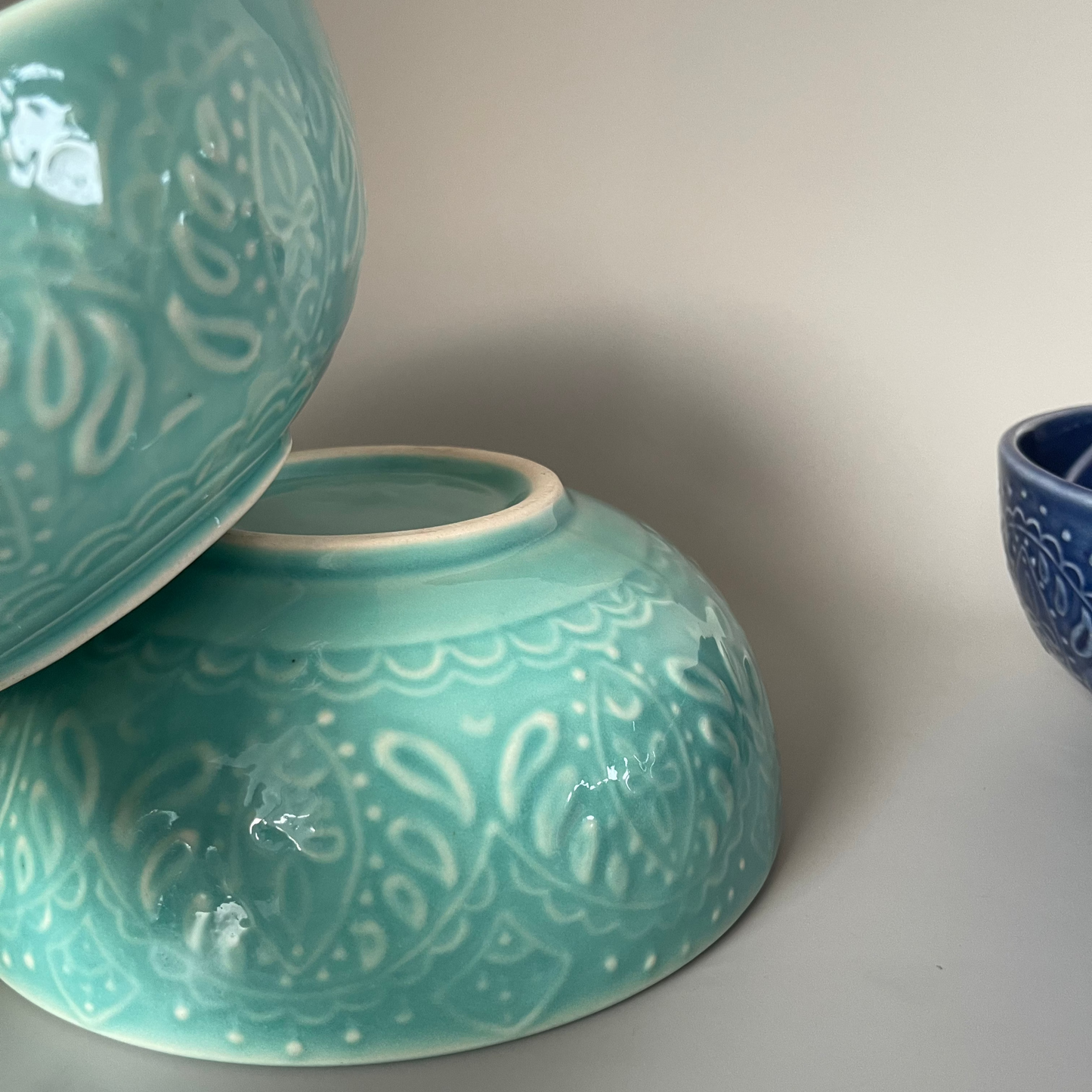 8-inch ceramic serve bowl with embossed flower design in blue and teal, perfect for salads, soups, and Indian side dishes