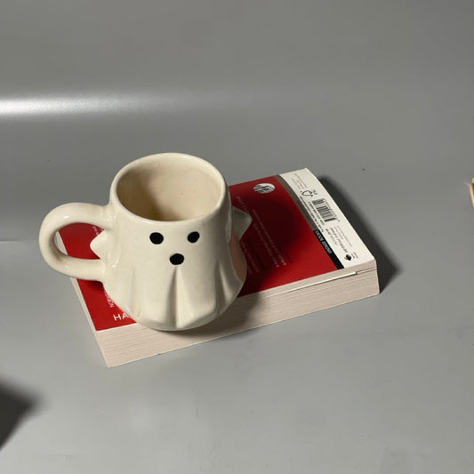 Medium-sized ghost-shaped ceramic mug  ideal for Halloween or everyday cozy drinks