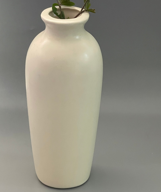 Ivora matte white vase styled on a console table