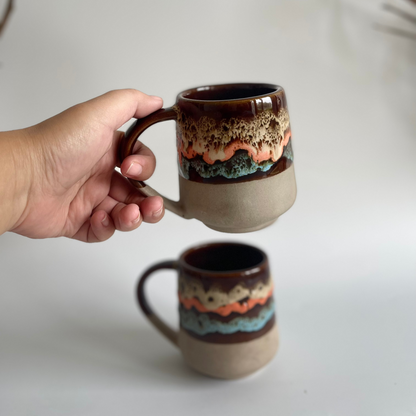 Mountain Moods ceramic mug with volcanic, ocean, and clay-inspired hand-glazed finish