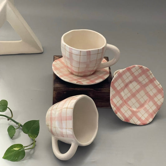 Pinterest-inspired pink checkered ceramic cup with matching saucer
