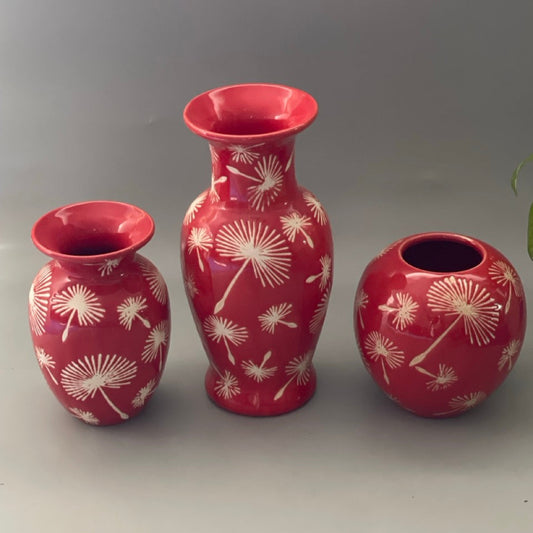 Set of 3 stoneware vases in red with folk-inspired prints, urn-shaped for shelf and console styling