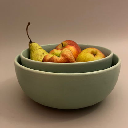 Set of 2 matte teal ceramic serve bowls in 8.5 and 7.5 inch sizes, ideal for salads, dals, or sabzis