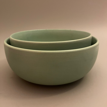 Teal Team Serve BowlsSet of 2 matte teal ceramic serve bowls in 8.5 and 7.5 inch sizes, ideal for salads, dals, or sabzis