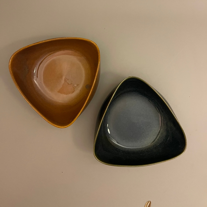 Set of uniquely shaped ceramic serve bowls in deep blue and brown tones, ideal for dips, sides, or snacks