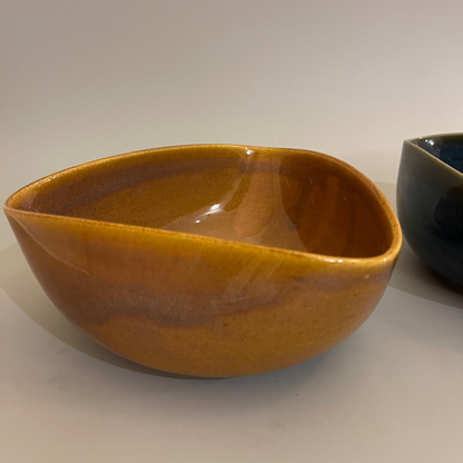 Set of uniquely shaped ceramic serve bowls in deep blue and brown tones, ideal for dips, sides, or snacks