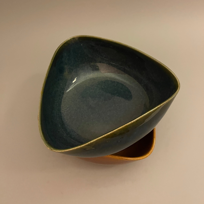 Set of uniquely shaped ceramic serve bowls in deep blue and brown tones, ideal for dips, sides, or snacks