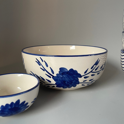 White 8.5 inch ceramic serve bowl with tribal flower motif, perfect for vegetables, grains, and main dishes