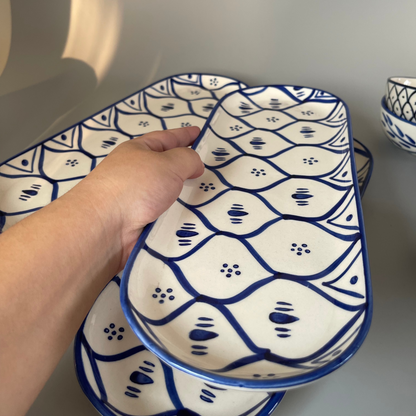 Ceramic platter with tribal-inspired patterns, ideal for serving salads, starters, or festive meals